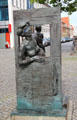 Waiting fisher woman with her child bronze sculpture by Jo Jastram. Greifswald, Germany.