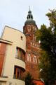 Art Moderne residence with St. Nicholas Church tower. Greifswald, Germany.
