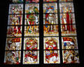 Stained glass windows depicting knights in medieval Germanic dress in Köln Cathedral. Köln, Germany.