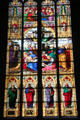 Stained glass windows depicting the Last Supper, Crucifixion & Evangelists with their symbols at Köln Cathedral. Köln, Germany.