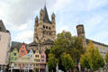 Towers of Great St. Martin church with Fischmarkt area in foreground. Köln, Germany.