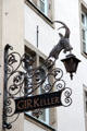 Ornate sign for Gir Keller wine cellar near Alter Markt. Köln, Germany.