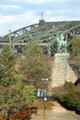 Hohenzollern Bridge with statue of Wilhelm II in the foreground. Köln, Germany.