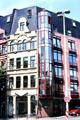 Corner building, near Römerturm, with modern & traditional elements on facade. Köln, Germany.