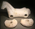 Ceramic miniature horse wheeled pull toy at New Aachen City Museum. Aachen, Germany
