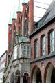 Gothic shield wall above Renaissance staircase at Lübeck Rathaus. Lübeck, Germany.