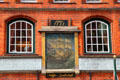Sailing ship painting above doorway of Seaman's Guildhall. Lübeck, Germany.