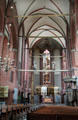 Interior of Abbey of Holy Cross brick Gothic church at Cultural History Museum. Rostock, Germany.