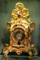 Rococo mantle clock with angel blowing trumpet from Würzburg? at Cultural History Museum. Rostock, Germany.
