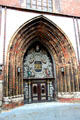 Gothic & Baroque entrance arch of St. Nicholas' Church. Stralsund, Germany.