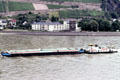 Barge traveling along Rhine River. Germany.