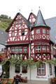Altes haus with half-timbered structure, turrets & gables. Bacharach, Germany.