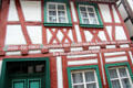 Half-timbered building with phrase in German Gothic script on facade. Bacharach, Germany.