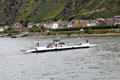 Small barge crossing Rhine River. Kaub, Germany.