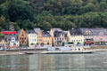 St. Goar with a Rhine River barge passing by. St. Goar, Germany.