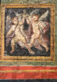 3. Roman ceiling fresco section depicting dancing cupids with bowl at Cathedral Museum. Trier, Germany.