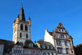 Tower of St Gangolf Church & upper story's of buildings on Hauptmarkt. Trier, Germany.