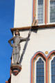 Statue of medieval soldier on guard on front facade of building on Hauptmarkt. Trier, Germany.