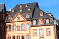 Ranges of dormer windows on stepped roof of building overlooking Hauptmarkt. Trier, Germany.