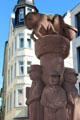 Figures on Grasshopper Fountain , founding members of Carnival Society with giant grasshopper on top by Willi Hahn. Trier, Germany.