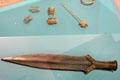 Hoard findings including bronze & gold jewelry & short sword at Trier Archaeological Museum. Trier, Germany.