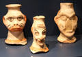 Ceramic vessels in form of grotesque caricature heads at Trier Archaeological Museum. Trier, Germany.