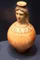 Ceramic vessel with sculpted human face serving as bottle neck at Trier Archaeological Museum. Trier, Germany.