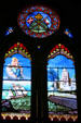 New Haven Cathedral stained glass showing Dominica as a safe port. Roseau, Dominica.
