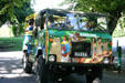 Decorated off-road tourist vehicle takes cruise ship groups through Dominica Botanic Gardens. Roseau, Dominica.