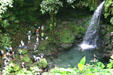 Cruise ship visitors at Emerald Pool in Morne Trois Pitons National Park. Dominica.