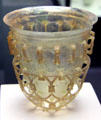 Roman glass cage cup from Cologne, Germany at Antikensammlungen. Munich, Germany.