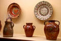 Painted redware ceramic pitchers & bowls from upper Franconia at Bavarian National Museum. Munich, Germany.