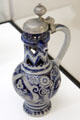 Stoneware covered cobalt blue painted puzzle jug from Westerwald at Bavarian National Museum. Munich, Germany.