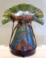 Art Nouveau tulip glass with floral metal mounting by Johann Lötz Witwe of Klostermuhle, Bohemia at Bavarian National Museum. Munich, Germany.