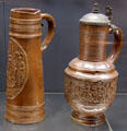 Stoneware tankard & covered jug with four seasons relief , both from Belgium at Deutsches Museum. Munich, Germany.