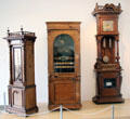 Two tall case music boxes plus tall clock at Deutsches Museum. Munich, Germany.