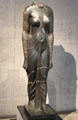 Standing figure of goddess Isis of granite at Museum Ägyptischer Kunst. Munich, Germany.