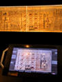 Movable computer screen synchronized to explain each section of Egyptian Book of the Dead above at Museum Ägyptischer Kunst. Munich, Germany.