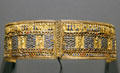 Armband with mummiform gods of gold & glass at Museum Ägyptischer Kunst. Munich, Germany.