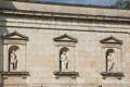 Niches in facade with replicas of Greek & Roman sculptures at Glyptothek. Munich, Germany.
