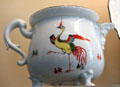 Meissen porcelain creamer with phoenix? In Hecke style at Meissen porcelain museum at Lustheim Palace. Munich, Germany.