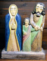 Carved figure of Mary & Joseph leading Jesus to visit temple at folk art Collection Gertrud Weinhold. Munich, Germany