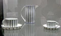 Porcelain cups & saucers plus pitcher by Josef Hoffmann for Vienna Porcelain Manuf. at Pinakothek der Moderne. Munich, Germany