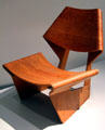 Molded layered wooden chair by Grete Jalk for Poul Jeppesen Stor of Denmark at Pinakothek der Moderne. Munich, Germany.