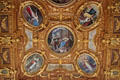 Paintings in gilded oval frames on ceiling in Goldener Saal at Augsburg Rathaus. Augsburg, Germany.
