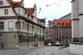 Streetcar curves between Augsburg Cathedral & Bishop's Palace on Hoher Weg. Augsburg, Germany.