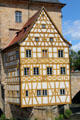 Half-timbered structure of Bamberg Old Town Hall cantilevered over Regnitz River. Bamberg, Germany.