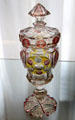 Glass covered pokal with engraved colored stained roundels from Bohemia at Coburg Castle. Coburg, Germany