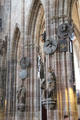 Carved holy figures on columns in St. Lawrence Church. Nuremberg, Germany.