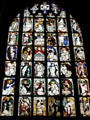 Stained glass window with religious scenes at St. Lawrence Church. Nuremberg, Germany.
